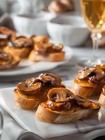 Gourmet mushroom bruschetta appetizers on toasted bread with caramelized onions and herbs, served with white wine for elegant dining and entertaining.