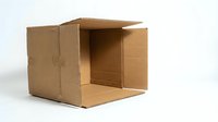 Open brown cardboard shipping box on white background, empty container for packaging and delivery services, isolated for design use.