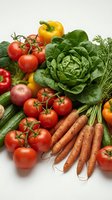 Fresh organic vegetables including tomatoes, carrots, lettuce, peppers and herbs arranged on white background for healthy cooking and nutrition concepts.