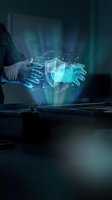 Hands holding glowing digital shield with network connections and data protection symbols, representing cybersecurity, data safety, and secure technology solutions for business.