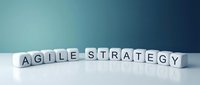Wooden letter blocks spelling AGILE STRATEGY on white surface with blue gradient background for business methodology and project management concepts.