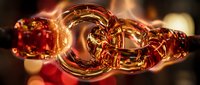 Golden liquid swirls in dynamic motion, creating abstract flowing forms with warm amber and red tones. Suitable for beverage, luxury, and creative design projects.