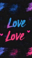 Graffiti style love text in gradient blue and pink colors on black background with small hearts and paint splash texture. For valentine cards and social media posts.