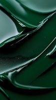 Abstract dark green liquid waves creating smooth glossy curves and reflective surfaces against black background, macro photography style composition.