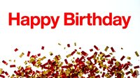 Happy Birthday text in bold red with festive red and gold confetti scattered on white background, for greeting cards and party designs.
