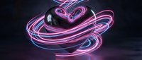 Glowing neon light trails forming heart shape with pink and blue colors on dark background for romantic design projects and love concepts.