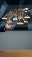 Businessman hand holding glowing network of transportation icons including cars, trucks, ships, and drones connected by golden lines, representing logistics and supply chain management solutions.
