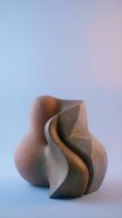 Abstract sculptural ceramic vase with flowing organic curves and twisted form on gradient background for modern interior design and home decor.