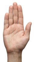 Open palm hand gesture isolated on white background showing stop sign communication symbol for presentation and design projects.