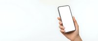 Hand holding modern smartphone with blank white screen mockup isolated on light background for app presentation and digital marketing materials.