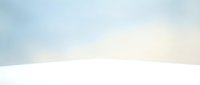 Soft winter background with snowy white surface and pale blue sky, minimal clean backdrop for product display or seasonal design.