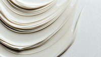Elegant cream and white abstract waves create soft flowing lines and gentle curves against light background, modern minimalist design for luxury branding.