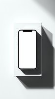 Modern smartphone with blank white screen on minimalist white surface with geometric shadows for mockup presentations and app development projects.