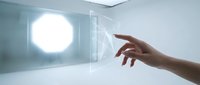 Hand reaching toward glowing holographic interface in futuristic white room with circular light source for technology and innovation concepts.