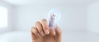 Hand touching glowing digital interface button with circular ripple effect on clean white background for technology and innovation concepts.