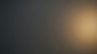 Abstract blurred gradient background transitioning from dark charcoal to warm golden light, suitable for overlays, web design, and creative projects.