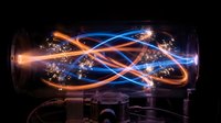 Futuristic energy streams with glowing particles flowing through transparent tube creating dynamic light trails and sparks on dark background.
