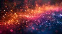 Magical glowing particles with bokeh effect in orange, pink and blue colors creating dreamy abstract background with blurred light spots and sparkles.