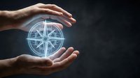 Male hands holding glowing geometric compass symbol representing navigation, direction, guidance, and strategic planning for business and technology concepts.