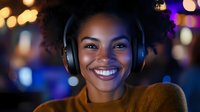 Young African American woman wearing headphones smiling broadly at night with blurred bokeh lights background, expressing joy and relaxation while listening to music.