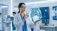 Female doctor examining holographic lung projection in modern medical laboratory for respiratory health diagnosis and treatment planning.
