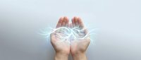 Open hands releasing glowing digital light waves and energy streams against neutral background, symbolizing innovation, technology transfer, and creative potential.