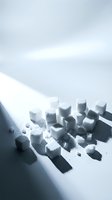 Scattered sugar cubes with shadows on white surface under bright light, suitable for food photography, culinary styling, and beverage advertising.