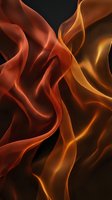 Abstract flowing flames in warm orange and red tones creating dynamic movement against dark background for modern design projects.