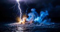 Dramatic lightning strike hitting ocean waves creating explosive splash with bright sparks and blue storm clouds in dark stormy seascape.