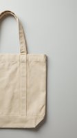 Blank natural linen tote bag with handles on white background, ready for custom branding, printing, or design projects for retail and promotional use.
