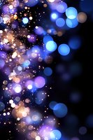 Magical glowing bokeh lights in blue, purple and gold colors on dark background create dreamy atmosphere for festive designs and holiday backgrounds.