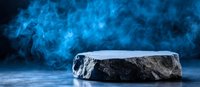 Stone platform with dramatic blue smoke effect on dark background creates mysterious atmosphere for product display and promotional content.