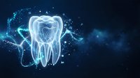 Glowing digital tooth with futuristic blue light particles on dark background, representing advanced dental technology and oral health care.