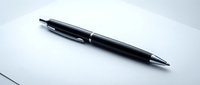 Black ballpoint pen with clip on white background, isolated and ready for design use on merchandise, marketing materials, and office product presentations.