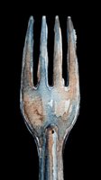 Weathered metal fork with four tines isolated on transparent background, ready for t-shirt design, clipart, stickers, print-on-demand products and sublimation projects.