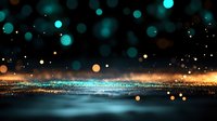 Magical glowing turquoise and golden bokeh lights on dark background with sparkles and reflective surface create dreamy atmospheric effect.