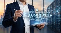 Professional businessman presenting digital file management and cloud storage solutions in modern office environment with city skyline at sunset.