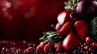 Fresh red fruits and vegetables arranged on dark background with water drops and bokeh effect, healthy organic produce for cooking and nutrition.