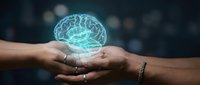 Glowing digital brain hologram floating above cupped hands representing artificial intelligence, neuroscience, mental health and innovative technology concepts.
