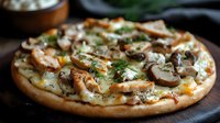 Homemade pizza topped with grilled chicken, fresh mushrooms, melted mozzarella and herbs on crispy crust, served on dark wooden surface. Food photography.