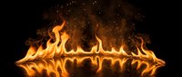 Intense orange flames dancing with sparks against black background, creating dramatic fire effect with reflection below for energy concepts.