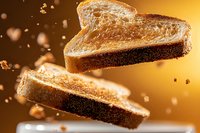 Sliced toasted bread floating in air with golden crumbs scattered around on warm brown background, macro food photography for bakery and restaurant menus.