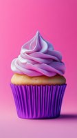 Sweet vanilla cupcake with swirled pink and purple frosting in purple paper cup against vibrant pink background, close-up view for bakery and dessert marketing.