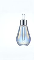 Elegant glass dropper bottle with iridescent finish isolated on white background for skincare serum cosmetic product packaging design.