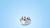 Miniature winter village scene with snow-covered houses, decorated evergreen tree, and festive holiday setting on isolated blue background for seasonal design projects.