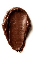 Rich chocolate spread smear isolated on white background, ready for cosmetics, food, and beauty product design applications.