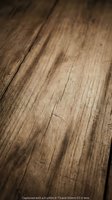 Weathered wooden surface with natural grain patterns and rustic texture showing age and character for backgrounds and design projects.
