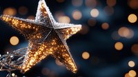 Glowing golden star decoration with frost against dark background with bokeh lights, creating magical holiday atmosphere. Festive winter decor element.
