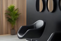 Modern black leather swivel chair in minimalist interior with wooden slat wall, round mirrors, and potted plant for contemporary office or home design.