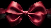 Elegant red satin bow tie with glossy finish on black background for formal events, weddings, and special occasions fashion accessories.